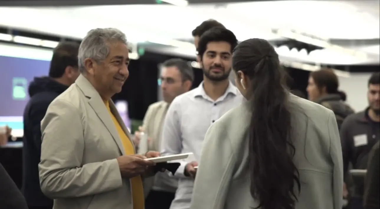 Professionals in conversation at a Persian Tech Network gathering